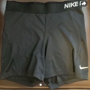 Nike pro size Medium logo is cracking peeling